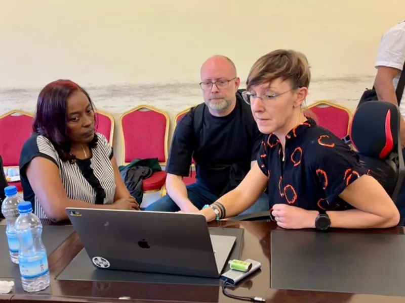 Workshop participants sitting in front of a PC in Addis Ababa